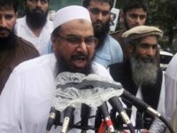 Hafiz Mohammad Saeed, chief of Jamaat-ud-Dawwa and founder of Lashkar-e-Taiba, speaks during an anti-Indian rally on Pakistan's Independence Day in Lahore, Pakistan, Wednesday, Aug. 14, 2013. The Pakistani nation is celebrating its 67th Independence Day, to mark its independence from British rule in 1947. (AP Photo/K.M. Chaudary)
