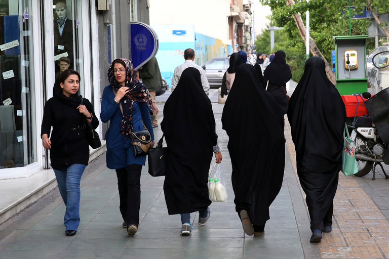 Iran’s Hard-Liners Crack Down on Models Not Wearing Head Scarves