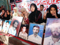 Px31-019
QUETTA: Dec31  Children of missing persons stage a sit in demo demanding release of their fathers outside Quetta Press Club.
ONLINE PHOTO by Naseer Ahmad Kakar