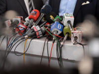 In this picture taken on June 28, 2018, microphones of the different Pakistani news channels are placed at a desk before a press conference outside the Supreme Court building, in Islamabad.
Facing abductions, censorship and financial ruin, journalists in Pakistan say they are under unprecedented pressure to bend to authorities' will as the country heads to nationwide polls, sparking allegations that the military is overseeing a "silent coup". / AFP PHOTO / AAMIR QURESHI / TO GO WITH: Pakistan-media-elections-military, FOCUS by David STOUT