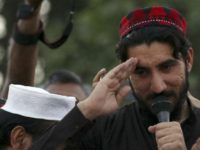epa06686477 Manzoor Pashteen (R), leader of Pashtun Tahafuz Movement (PTM) speaks to supporters during a gathering in Lahore, Pakistan, 22 April 2018 (issued 23 April). Thousands of supporters of PTM gathered in Lahore demanding the government to produce missing persons who were allegedly taken by the intelligence agencies on pretext of fighting terrorism.  EPA-EFE/RAHAT DAR