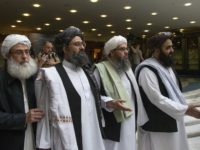 Mullah Abdul Ghani Baradar, the Taliban's top political leader (second from left), has been involved in the group's negotiations with U.S. officials.